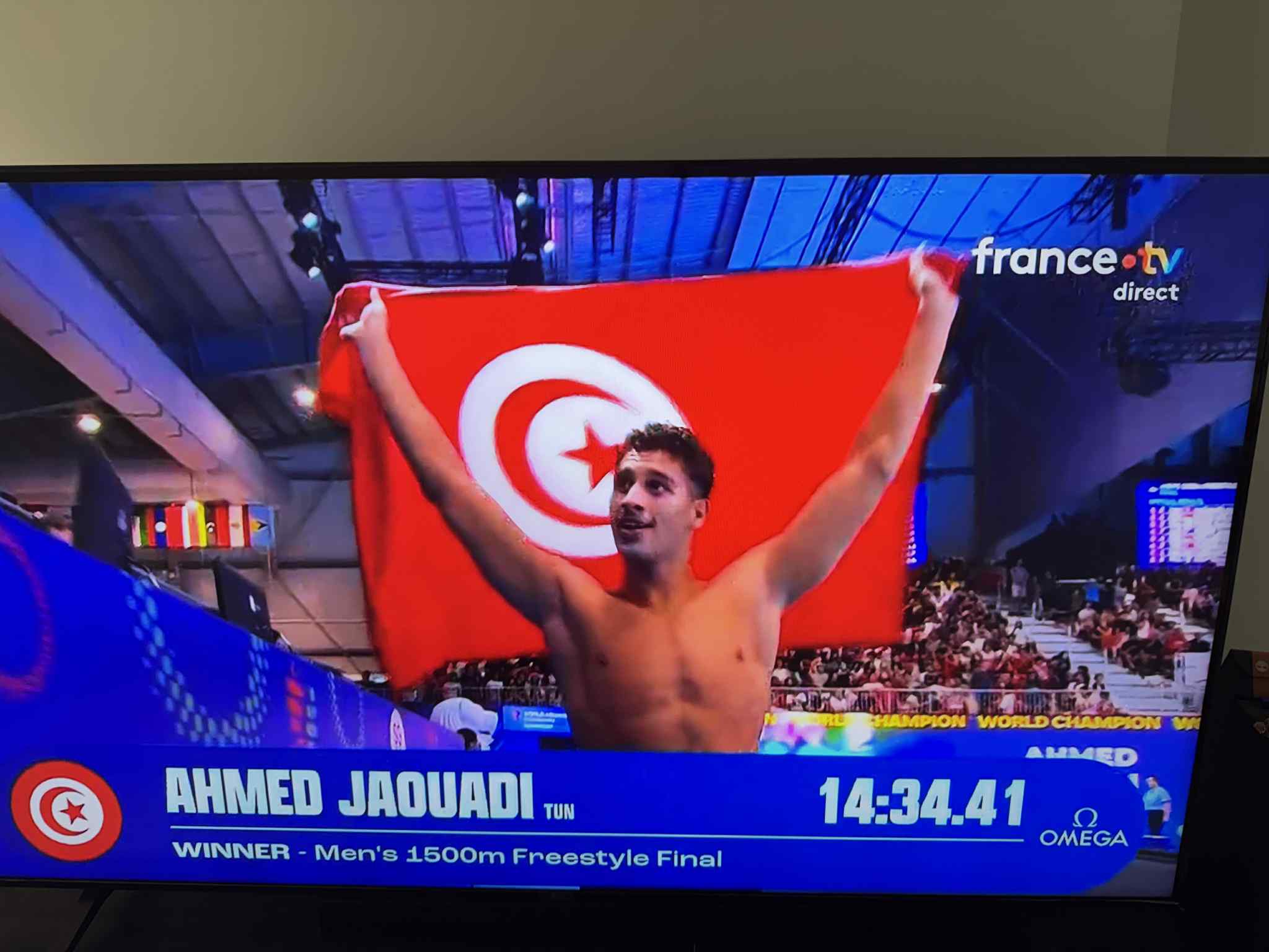 البطل العالمي  احمد الجوادي يصنع الحدث والتاريخ من جديد في سنغافورة و يفوز بلقب عالمي جديد في 1500 متر حرة