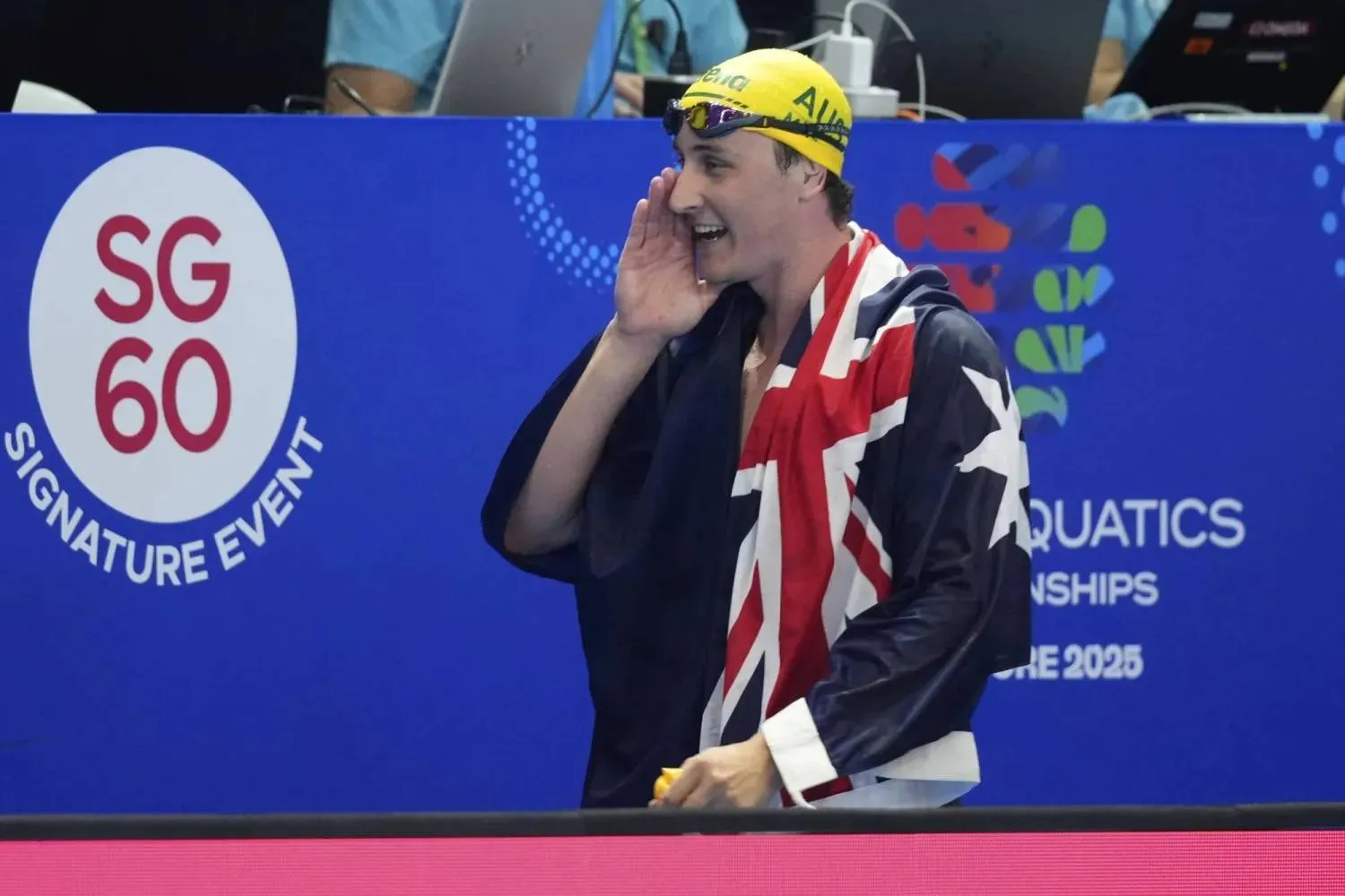 الأسترالي ماكيفوي يحطم الرقم القياسي العالمي لسباق 50 متر سباحة حرة