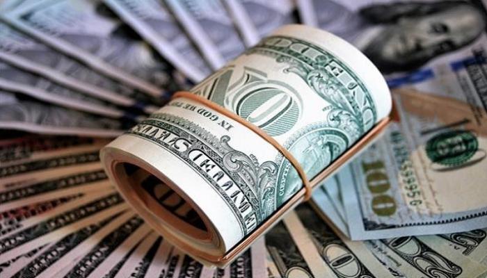 الدولار يرتفع والين يتراجع قبيل قراري المركزي الأمريكي وبنك اليابان